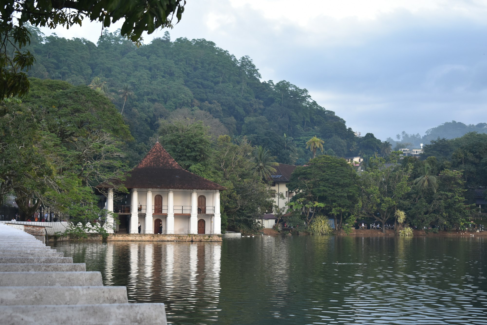 The white and gold facade of the Temple of the Tooth in Kandy